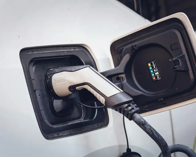 Charging cable plugged into an electric vehicle